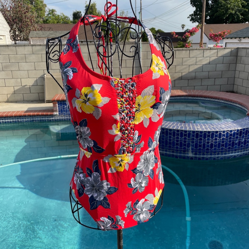 Peach/pink swim suit with yellow, blue & gray flower print